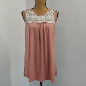 Peach colored lace detailed tank top